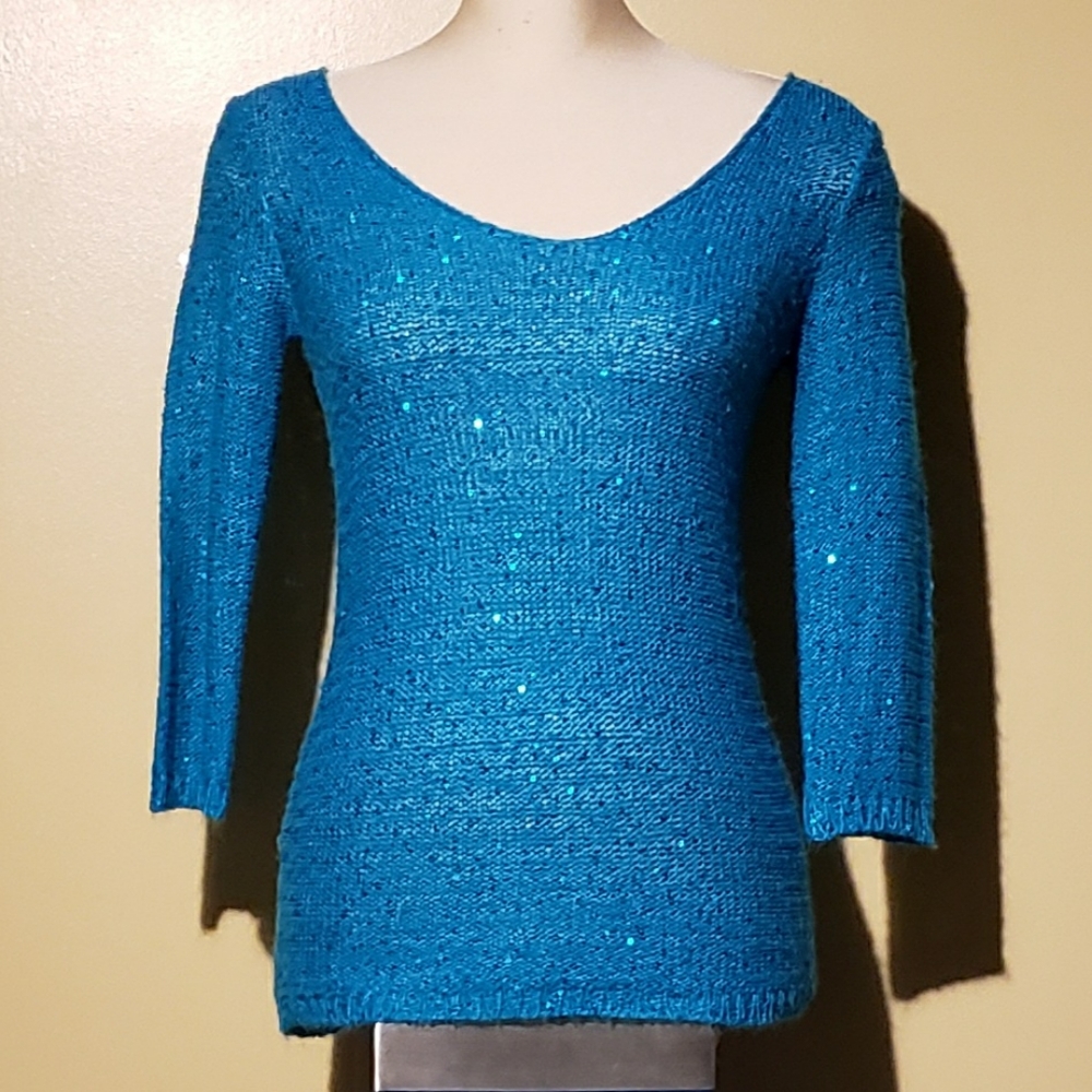 Sweater. Lightly sequined teal blue sweater.